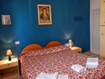 Altra camere da letto di Ville Paola e Daniela | Appartamenti sul mare in Toscana