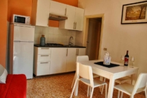 Sala da pranzo e cucina Ville Paola e Daniela | Appartamenti sul mare in Toscana