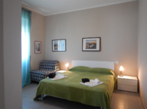 Altra camere da letto di Ville Paola e Daniela | Appartamenti sul mare in Toscana